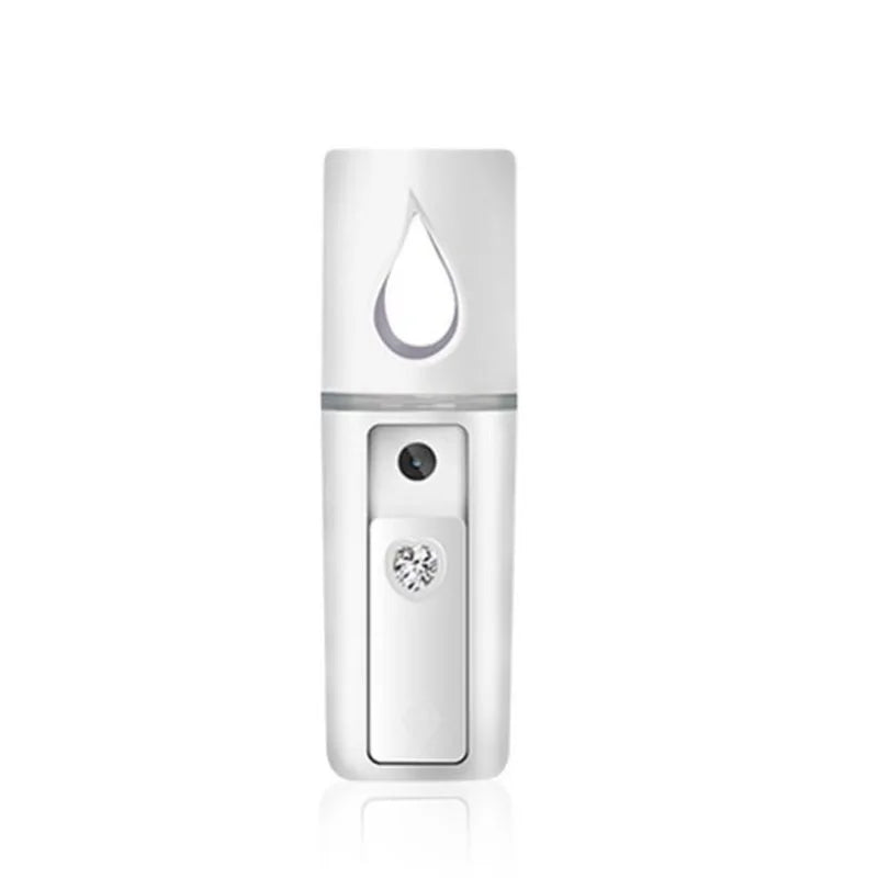 Portable facial steamer with mist spray and mirror, weighs 50g, dimensions 10.5x3cm.