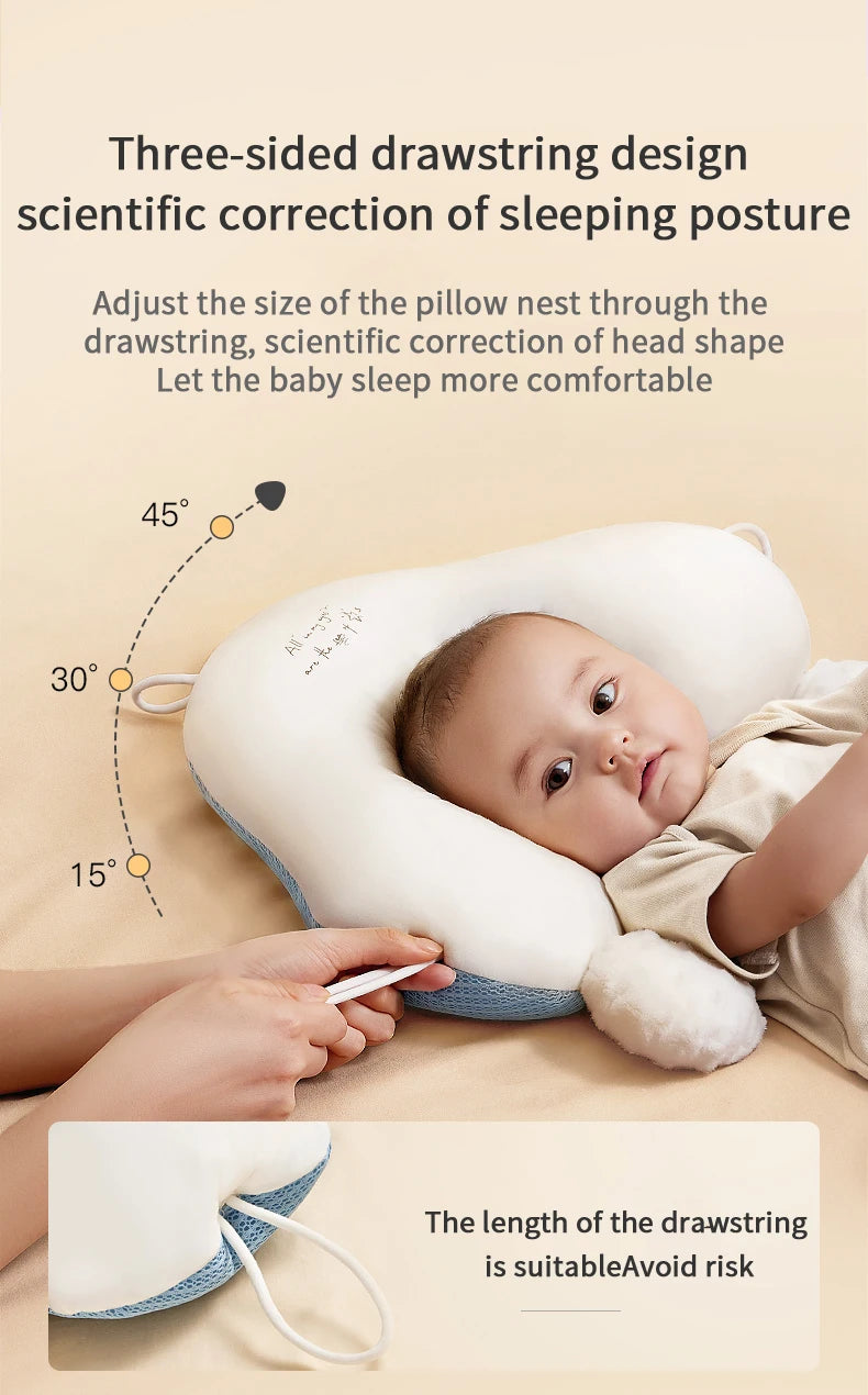 Adjustable sleeping pillow with detachable drawstring for customized fit and comfort for newborns, infants, and toddlers.